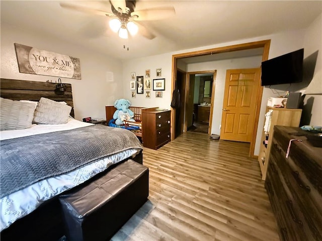 1051 E Chippewa Ave, Bruce, WI 54819 - bedroom featuring wood finished floors and ceiling fan