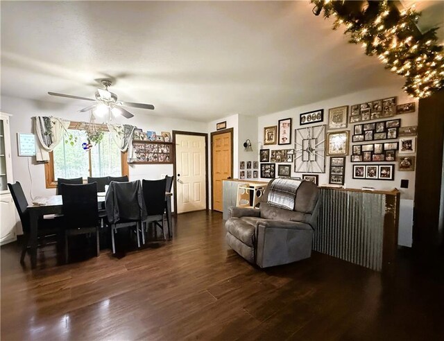1051 E Chippewa Ave, Bruce, WI 54819 - living area featuring a ceiling fan and wood finished floors