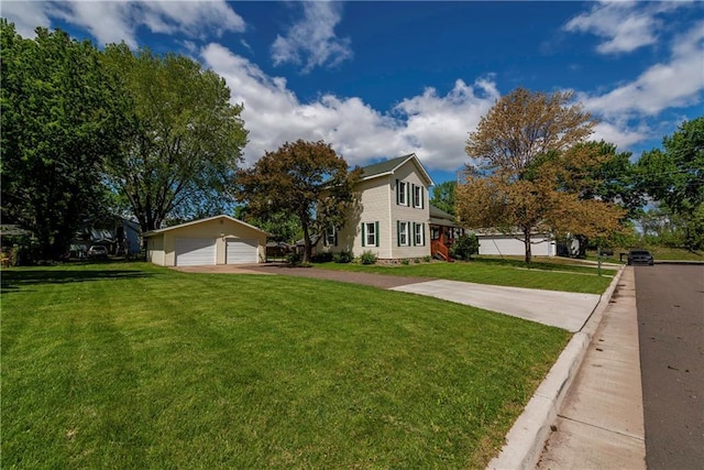 14 Chippewa St, Chippewa Falls, WI 54729 - view of front of property with a front lawn, a detached garage, and an outdoor structure