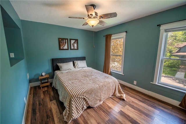 14 Chippewa St, Chippewa Falls, WI 54729 - bedroom featuring wood finished floors, baseboards, and ceiling fan