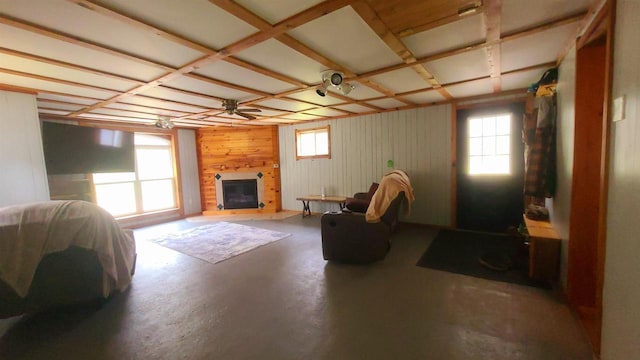 N18733 Short Cut Rd, Pembine, WI 54156 - living area featuring a glass covered fireplace and concrete flooring
