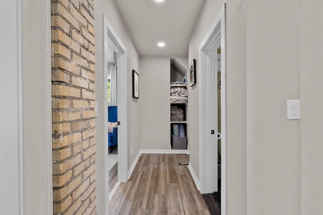 8606 State Highway 57, Baileys Harbor, WI 54202 - hallway with wood finished floors, baseboards, and recessed lighting