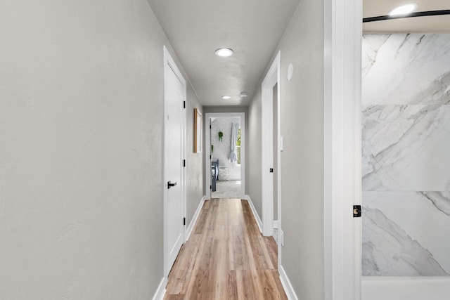 8606 State Highway 57, Baileys Harbor, WI 54202 - hallway featuring light wood-type flooring, baseboards, and recessed lighting