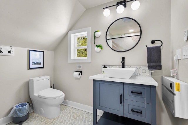 8606 State Highway 57, Baileys Harbor, WI 54202 - full bath with lofted ceiling, vanity, toilet, baseboards, and heating unit