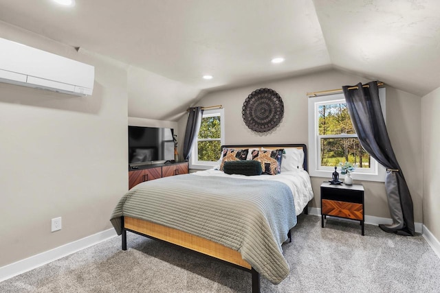 8606 State Highway 57, Baileys Harbor, WI 54202 - carpeted bedroom featuring vaulted ceiling, baseboards, a wall mounted air conditioner, and recessed lighting