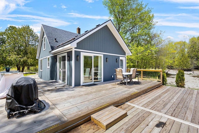 8606 State Highway 57, Baileys Harbor, WI 54202 - wooden deck featuring outdoor dining space
