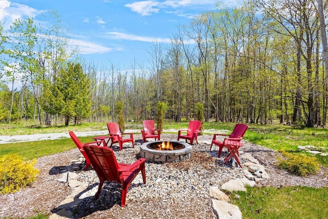 8606 State Highway 57, Baileys Harbor, WI 54202 - view of patio / terrace with an outdoor fire pit
