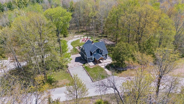 8606 State Highway 57, Baileys Harbor, WI 54202 - aerial view of property and surrounding area with a heavily wooded area