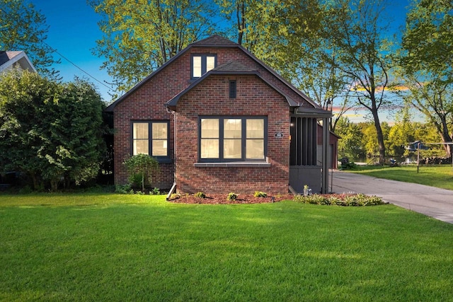 302 River Hts, Shawano, WI 54166 - bungalow featuring a front yard and brick siding