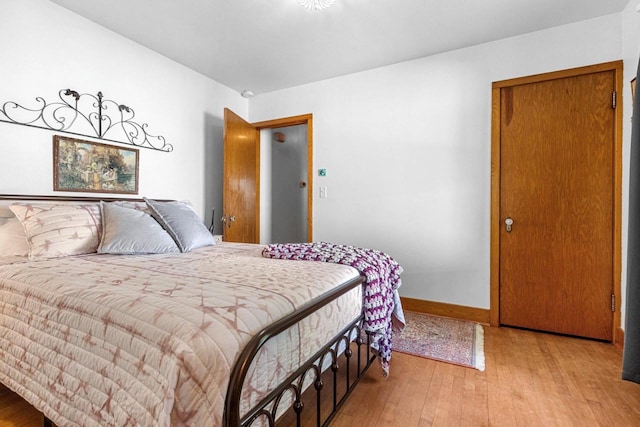 302 River Hts, Shawano, WI 54166 - bedroom with light wood-style floors and baseboards