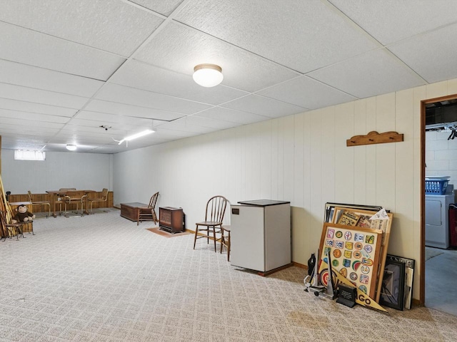 724 Mayflower Ave, Sheboygan, WI 53083 - sitting room featuring washer / clothes dryer, a drop ceiling, and carpet flooring