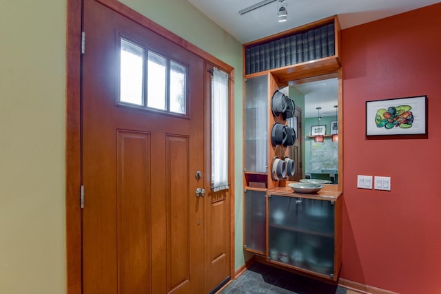 127 S Franklin St Unit 10, Madison, WI 53703 - foyer entrance featuring rail lighting and baseboards