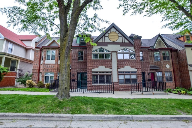 127 S Franklin St Unit 10, Madison, WI 53703 - view of front of house featuring brick siding and a front lawn