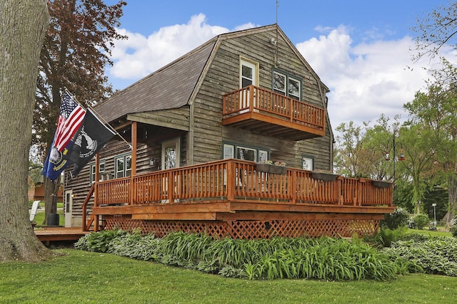 10317 195th Ave, Bristol, WI 53104 - back of house featuring a balcony, a deck, and a lawn