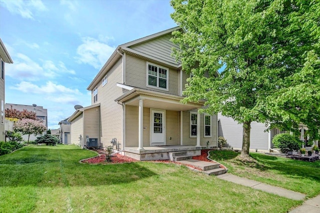 9305 Briar Haven Dr, Verona, WI 53593 - traditional style home with covered porch, a front lawn, and central air condition unit