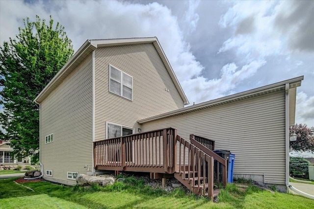 9305 Briar Haven Dr, Verona, WI 53593 - rear view of property featuring a wooden deck and a lawn