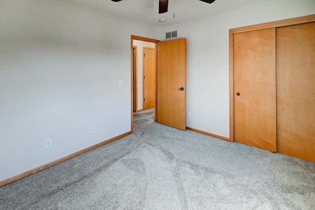 9305 Briar Haven Dr, Verona, WI 53593 - unfurnished bedroom featuring carpet flooring, baseboards, a closet, and ceiling fan