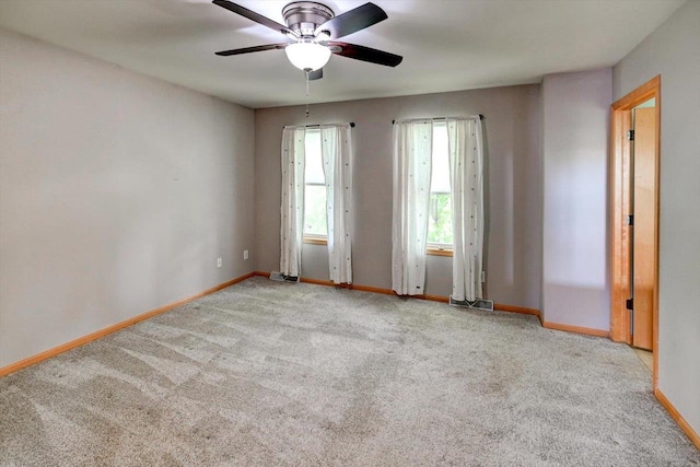 9305 Briar Haven Dr, Verona, WI 53593 - carpeted empty room featuring a ceiling fan and baseboards