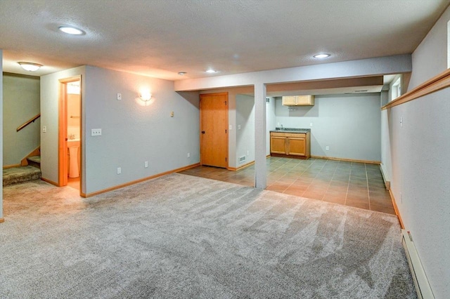 9305 Briar Haven Dr, Verona, WI 53593 - finished basement featuring light carpet, stairs, baseboards, recessed lighting, and a textured ceiling
