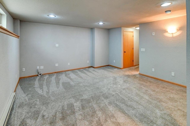 9305 Briar Haven Dr, Verona, WI 53593 - carpeted empty room featuring baseboard heating, recessed lighting, baseboards, and a smoke detector
