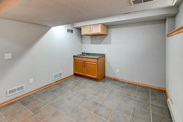 9305 Briar Haven Dr, Verona, WI 53593 - indoor bar with baseboards, a textured ceiling, and baseboard heating