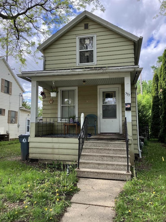 397 W Division St, Fond Du Lac, WI 54935 - view of front of property with a porch and cooling unit