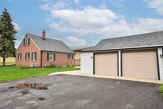 10339 W Hampton Ave, Milwaukee, WI 53225 - detached garage with central air condition unit