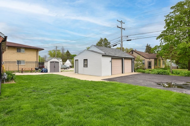 10339 W Hampton Ave, Milwaukee, WI 53225 - view of yard featuring a detached garage