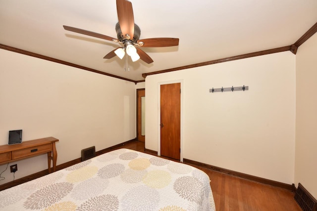 10339 W Hampton Ave, Milwaukee, WI 53225 - bedroom with wood finished floors, crown molding, baseboards, and ceiling fan