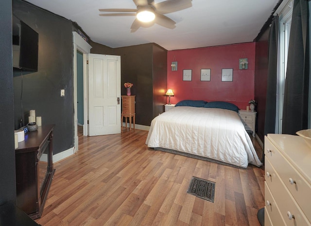 375 S Bridge St, Markesan, WI 53946 - bedroom featuring light wood-style floors, baseboards, and a ceiling fan
