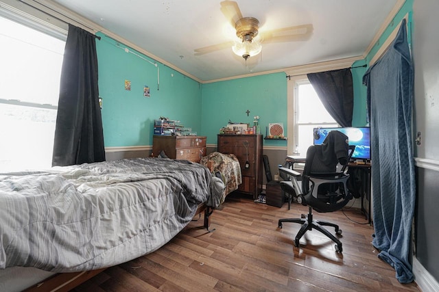 375 S Bridge St, Markesan, WI 53946 - bedroom with wood finished floors, a desk, and a ceiling fan
