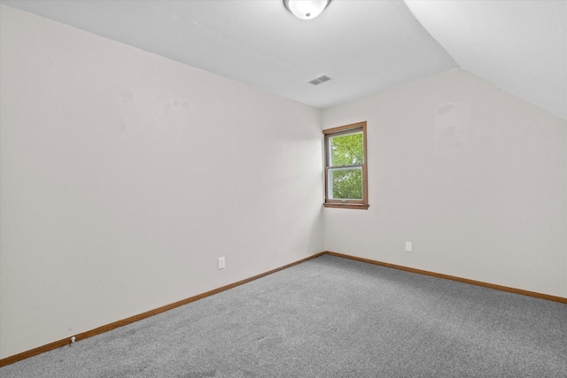 3046 N 57th St, Milwaukee, WI 53210 - bonus room with vaulted ceiling, carpet flooring, and baseboards
