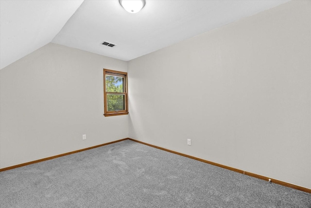 3046 N 57th St, Milwaukee, WI 53210 - additional living space featuring carpet flooring, baseboards, and vaulted ceiling