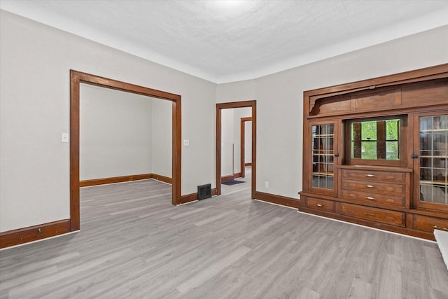 3046 N 57th St, Milwaukee, WI 53210 - unfurnished room with wood finished floors and baseboards