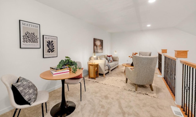 2725 Hidden Dr, Saint Francis, WI 53235 - living area featuring light colored carpet, vaulted ceiling, recessed lighting, and baseboards
