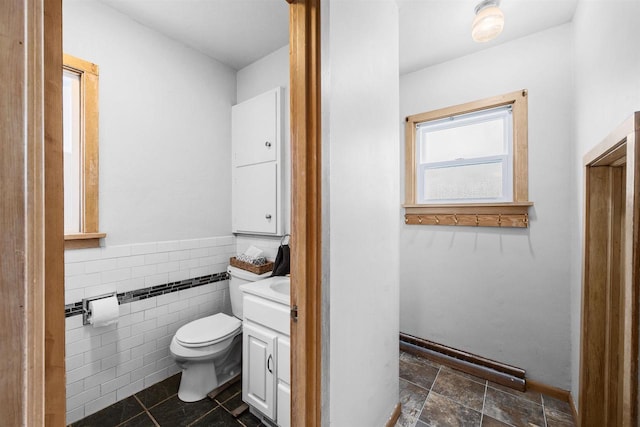 E3722 County Road Ee, Waupaca, WI 54981 - bathroom with vanity, toilet, and tile walls