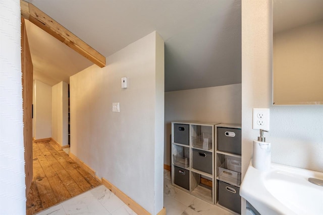 E3722 County Road Ee, Waupaca, WI 54981 - bathroom featuring marble look tile flooring and baseboards
