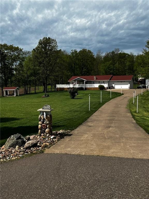 10384 W County Line Rd, Exeland, WI 54835 - surrounding community featuring asphalt driveway and a yard