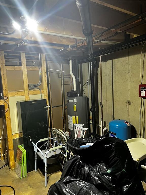 10384 W County Line Rd, Exeland, WI 54835 - basement with water heater and a water pressure tank