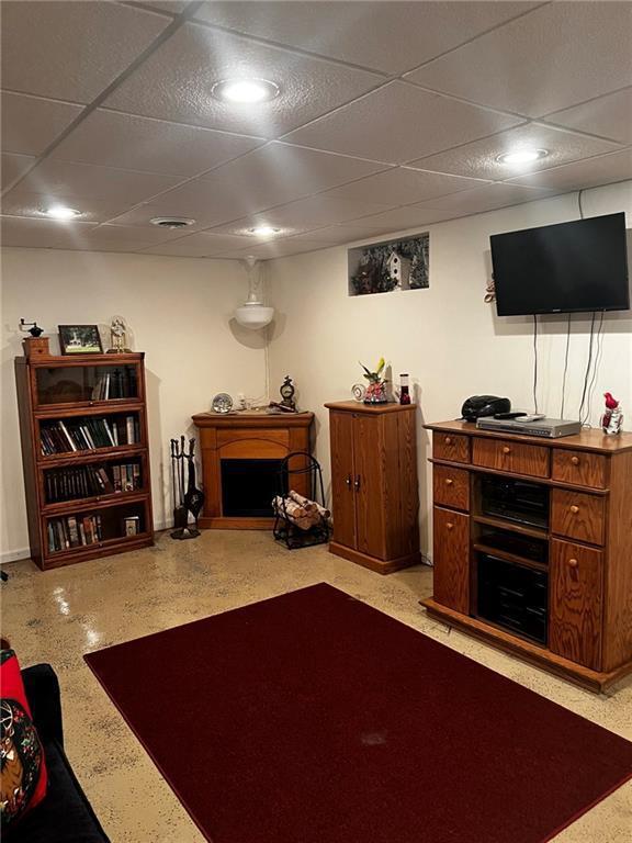 10384 W County Line Rd, Exeland, WI 54835 - living area with a fireplace, a drop ceiling, and recessed lighting