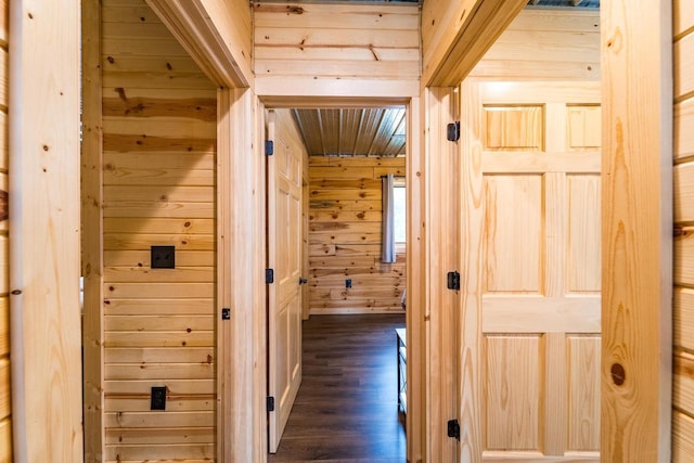 N11594 Woodland Dr, Tomahawk, WI 54487 - hall featuring wood walls and dark wood-type flooring