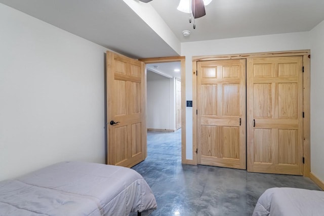 N11594 Woodland Dr, Tomahawk, WI 54487 - bedroom featuring finished concrete flooring, baseboards, and ceiling fan