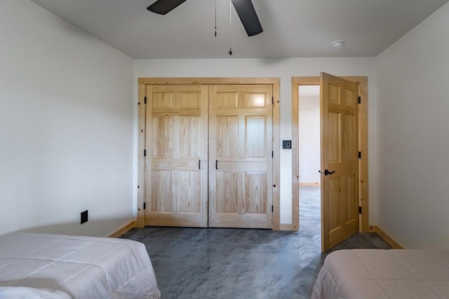 N11594 Woodland Dr, Tomahawk, WI 54487 - bedroom with baseboards, ceiling fan, and a closet