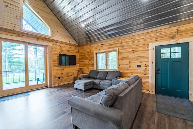 N11594 Woodland Dr, Tomahawk, WI 54487 - living room with high vaulted ceiling, healthy amount of natural light, wooden walls, wood ceiling, and dark wood finished floors