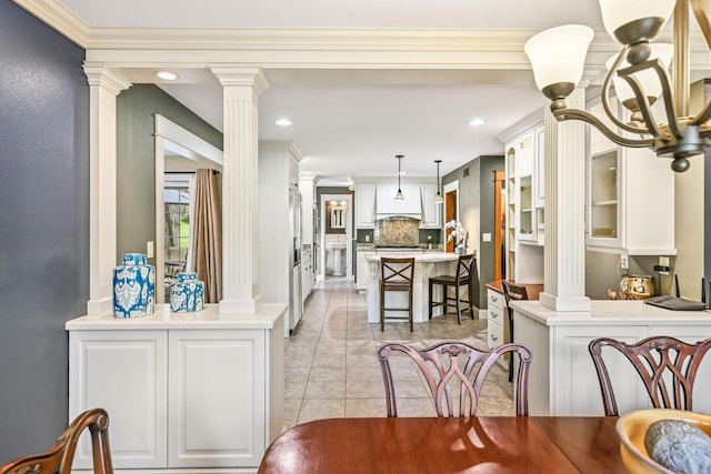 1333 N 120th St, Wauwatosa, WI 53226 - dining area featuring ornate columns, recessed lighting, ornamental molding, and light tile patterned flooring