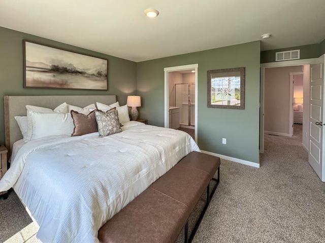 505 Oak Opening Dr, Stoughton, WI 53589 - carpeted bedroom featuring baseboards and ensuite bathroom
