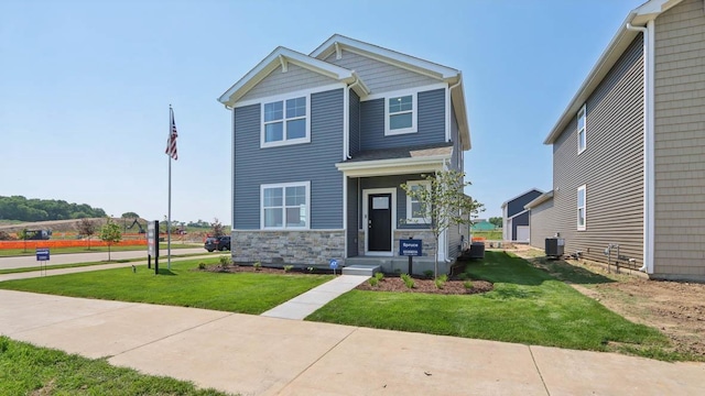 505 Oak Opening Dr, Stoughton, WI 53589 - craftsman-style house with stone siding and a front lawn
