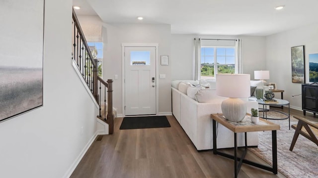 505 Oak Opening Dr, Stoughton, WI 53589 - entryway featuring stairway, wood finished floors, and recessed lighting