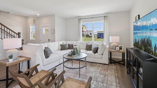 505 Oak Opening Dr, Stoughton, WI 53589 - living room with wood finished floors, stairs, and recessed lighting
