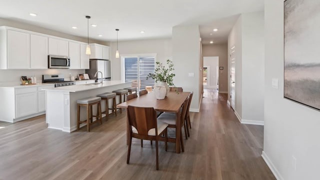 505 Oak Opening Dr, Stoughton, WI 53589 - dining space with wood finished floors and recessed lighting